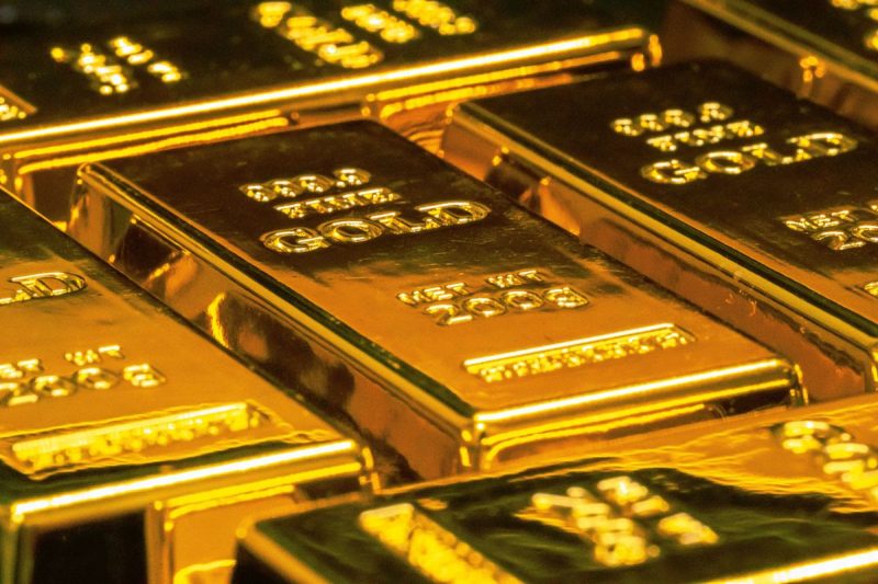 <strong>Leading gold analysis firm Metals Focus published its annual Precious Metals Investment Focus report</strong> <strong>on Saturday (October 25).</strong>
The report outlines the investment options available for those interested in leveraging rising demand for precious metals such as gold and silver. The report also highlights key supply and demand trends shaping the precious metals market and driving prices now and over the next 12 months.
Gold surged more than 65 percent from the start of 2025 to its record high of US$4,379.13 per ounce on October 17. Not to be outdone, silver skyrocketed by more than 88 percent to peak at its highest-ever price of US$54.47 per ounce on the same day. 
Although prices for both precious metals have since pulled back on profit-taking, Metals Focus believes the conditions that created these record high prices are still very much in play.
                            US trade policy driving gold prices in 2025                                
Metals Focus analysts attribute gold’s stellar performance in 2025 to a number of factors largely centered on growing global economic uncertainty and ongoing geopolitical conflicts. Gold’s safe haven status is highly favored in these conditions, attracting both retail and institutional investors as well as central banks.
However, the firm sees US President Donald Trump’s trade policies as the most influential: “In our view, the single most important factor has been uncertainty around US trade policy.”
Trump’s constant trade war waffling has businesses and governments scrambling to keep up and unable to plan for the future. As tariffs increase the price of goods while disrupting supply chains, inflation is becoming stickier. This is baking in more macroeconomic risks into the global economy, and in turn raising the risk for stagflation—an ideal environment for higher gold prices.
The Federal Reserve’s reversal of its monetary policy in mid-September 2025 with its first interest rate cut and the anticipation of further rate cuts to come are further boosting the gold price. The sustainability of growing US debt and the waning strength of the US dollar on the global stage are also price supporting factors for the yellow metal.
Central bank gold buying, which has reached record levels in recent years, also continued to be net positive in 2025, further driving demand. “Put together, these drivers explain why gold has not only reached fresh highs in 2025, but also why pullbacks have been shallow and short-lived, as investors have been rushing to buy dips,” states Metals Focus.
                            Silver shoots up on liquidity squeeze                                
The same forces sending gold prices to new heights are also bringing silver along for the ride. 
Silver often lags behind its sister metal, and this latest price cycle was no exception. However, investor belief that silver remains undervalued given strong industrial demand and unprecedented tight supply finally pushed the metal to break on through to the other side of a 45-year record high.
Metals Focus also points to the liquidity squeeze in the silver futures market, specifically concerning the COMEX in London. As the immediate supply of silver has not been enough to meet rising demand, the spot price for silver has risen higher than the price of futures contracts, a phenomenon known as backwardation. This creates a squeeze on short sellers who must now buy back silver contracts at higher prices. 
The situation amplified silver’s rally in early to mid-October. However, later in the month shipments of silver from New York and China helped to alleviate this pressure.
                            Gold price outlook for 2026                                
Looking forward, the trends underlying much of gold’s record-breaking price momentum are expected to remain strong well into next year. 
Metals Focus sees the price of gold posting another annual average high of US$4,560 per ounce as it heads toward US$5,000 in 2026, potentially reaching a record US$4,850 in the fourth quarter. 
These gains in gold are projected to materialize despite supply side growth. Metals Focus is forecasting a surplus of 41.9 million ounces in 2026, up 28 percent year-over-year. The firm sees gold mine production reaching another record high in 2026 at the same time that gold recycling could climb by 6 percent to a 14-year high in jewellery demand is likely to be affected by high prices, low consumer confidence, and economic uncertainty.
What will move gold prices higher in 2026?
Gold investors should take cues from interest rate moves, inflation levels, strength or weakness in the US dollar and sentiment surrounding the independence of the Federal Reserve. Of course, US trade policy will continue to be a main theme for precious metals over the next 12 months.
“As we have witnessed since the beginning of the Trump 2.0 administration, the abrupt and often unpredictable nature of US policy moves and the resulting uncertainty for the global trade system, and in turn the global economy, is expected to be a key driver of sentiment towards gold,” stated the firm.
Further driving demand, central banks around the world are expected to remain net buyers of safe-haven gold as the global push toward de-dollarization continues.
Gold and silver price outlook
<em><em>Chart via </em></em><em><em>Metals Focus</em></em>, Bloomberg<em><em></em></em>
                            Silver price outlook for 2026                                
As for silver, the white metal will continue to be seen as a more affordable alternative to gold. Metals Focus is looking for silver to average US$57 per ounce next year and even take a run at the US$60 level in mid-to-late 2026.
Silver has not only benefitted from safe-haven investor demand and strong industrial demand but also tight supply. Yet, the firm notes that the ongoing supply deficit for silver is expected to fall from 143.6 million ounces in 2024 to 63.4 million ounces in 2025. That figure is expected to shrink further to 30.5 million ounces in 2026.
Nevertheless, the silver market remains in a supply deficit at a time when demand is strong. “We therefore remain bullish towards silver for the rest of this year and 2026,” noted the report’s authors, who expect silver to continue outperforming gold at least in the first half of the new year.
In response, the gold:silver ratio has the potential to continue falling in 2026. However, Metals Focus believes the market will see this trend reverse in the back half of the year as silver loses some steam. 
Gold:silver ratio
<em><em></em></em><em><em>Chart via </em></em><em><em>Metals Focus</em></em><em><em>, Bloomberg</em></em>
                            Investor takeaway                                
Overall, Metal Focus is confident the precious metals bull market will continue throughout the remainder of 2025 and into 2026. Gold is especially benefitting from its safe-haven status at a time of heightened macroeconomic and geopolitical uncertainty. Silver is tracking gold’s ascent for the same reasons, in addition to tight above ground supply and sustained industrial demand.
For those who think they’ve missed out on the gains to be made in this latest precious metals bull cycle, there’s still plenty of upside to be had in the gold and silver markets in Q4 2025 and heading into 2026. 
<strong>Securities Disclosure: I, Melissa Pistilli, currently hold no direct investment interest in any company mentioned in this article.</strong>
This post appeared first on investingnews.com Metals Focus: Gold to Average US$4,560 in 2026 on Unpredictable US Trade Policy and Potential Stagflation